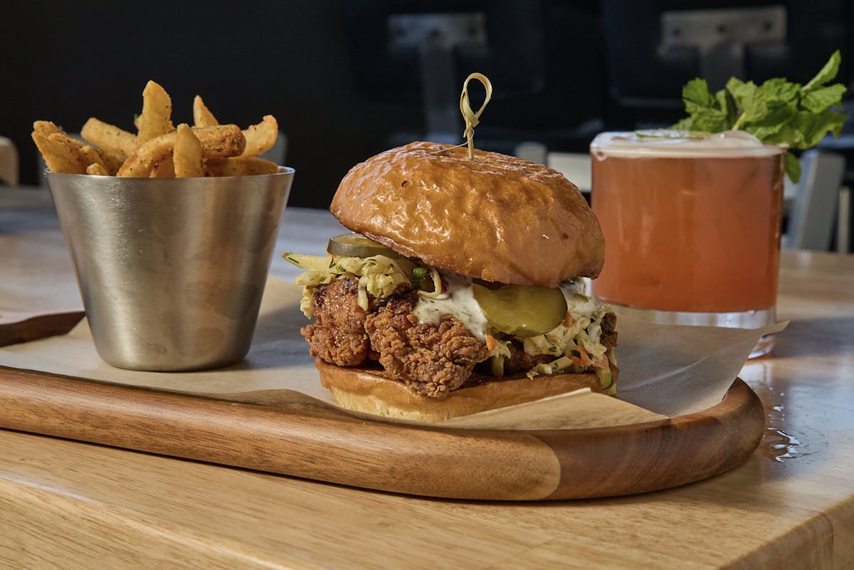 a sandwich sitting on top of a wooden table
