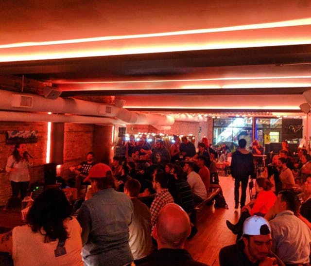 a group of people in a bar