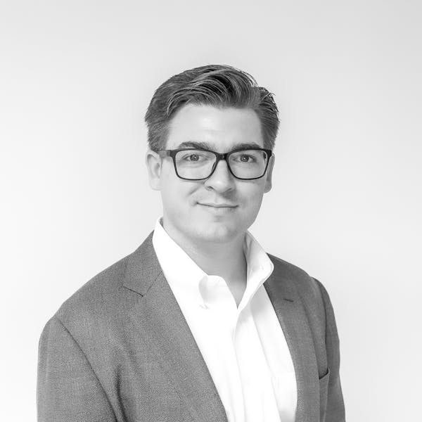 a man wearing suits