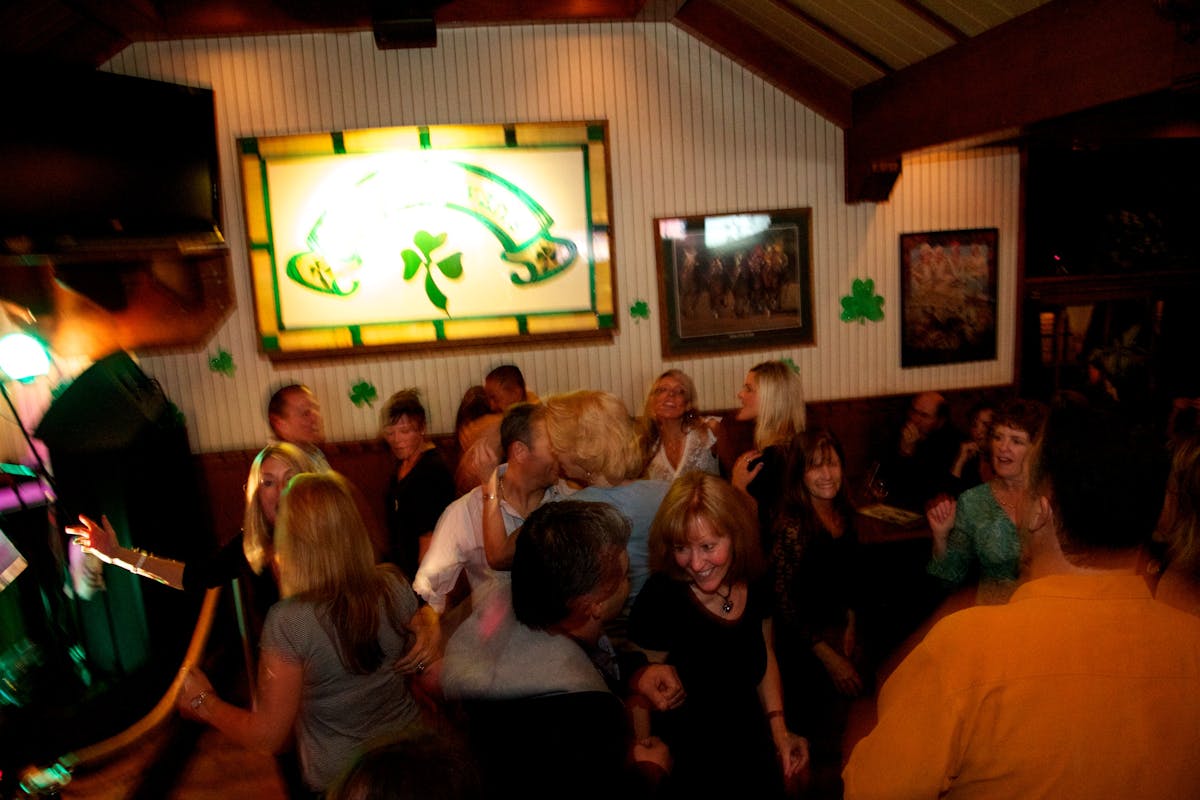 a group of people standing in a room