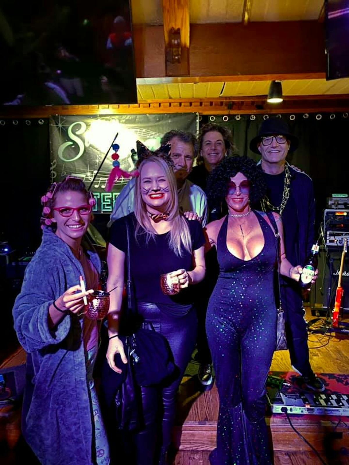 a group of people posing for the camera