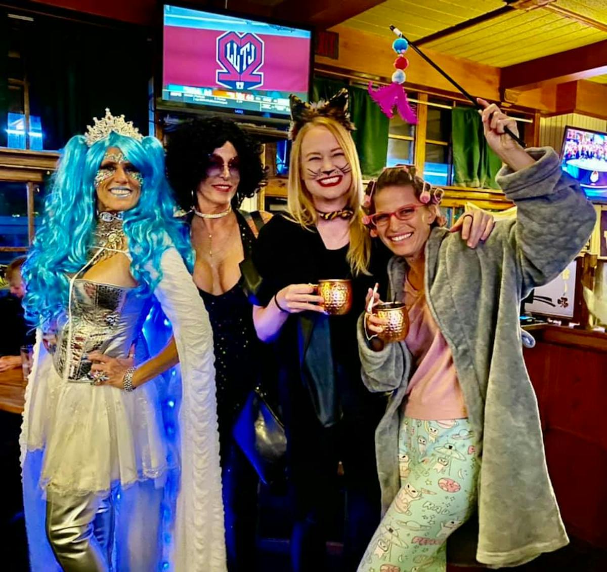 a group of people posing for the camera
