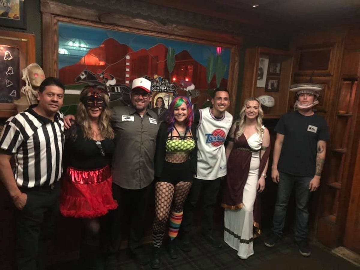 a group of people posing for the camera