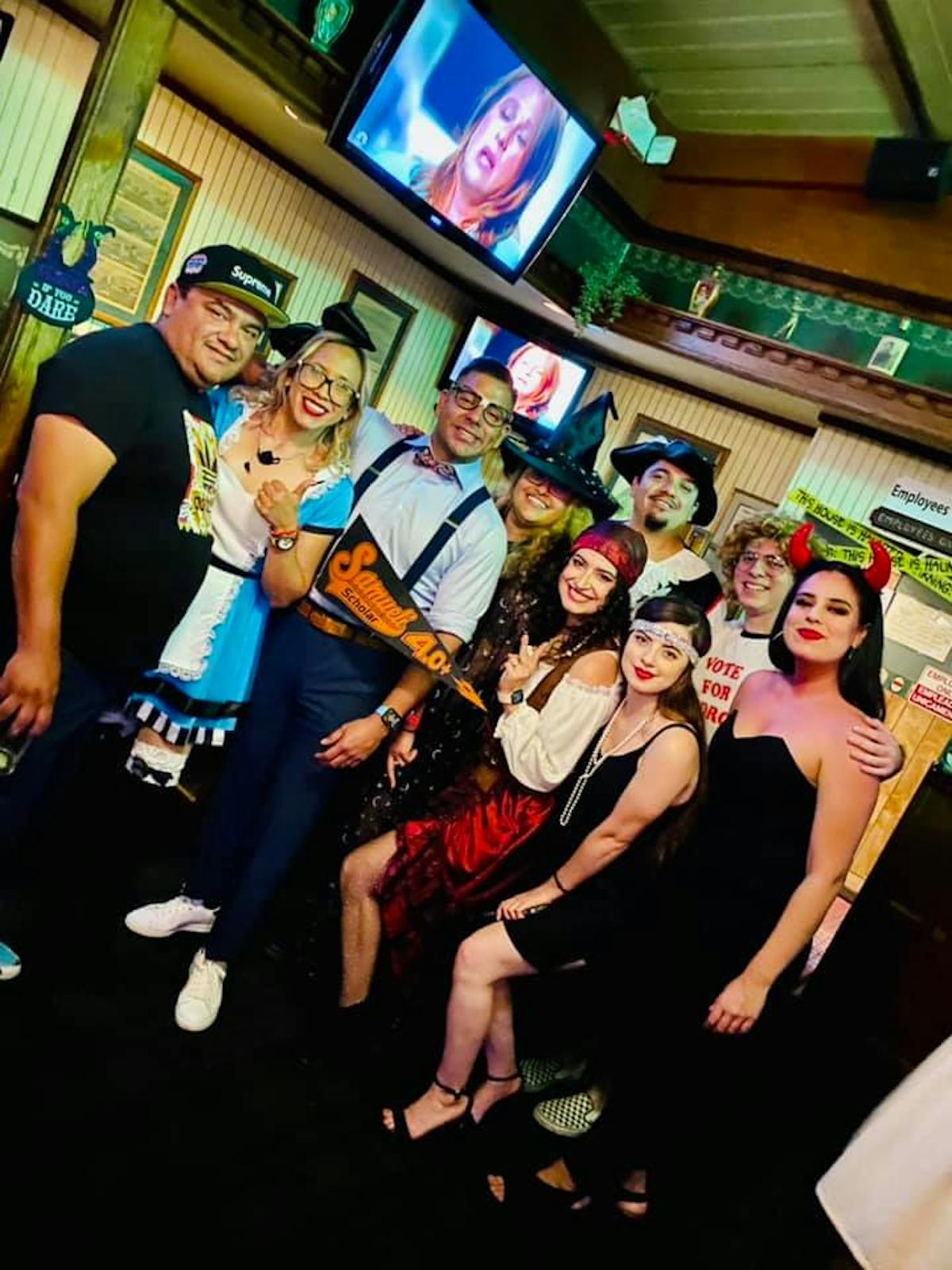 a group of people posing for the camera