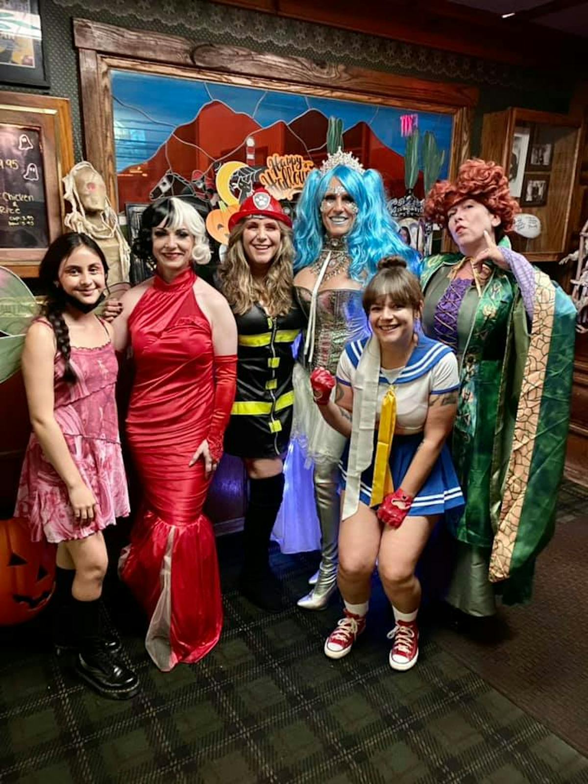 a group of people posing for a photo