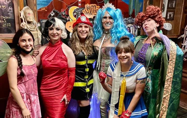 a group of people posing for the camera