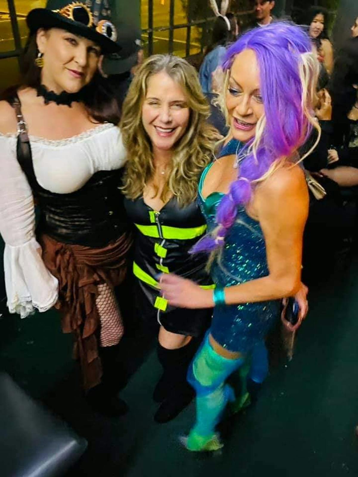 a group of people posing for the camera