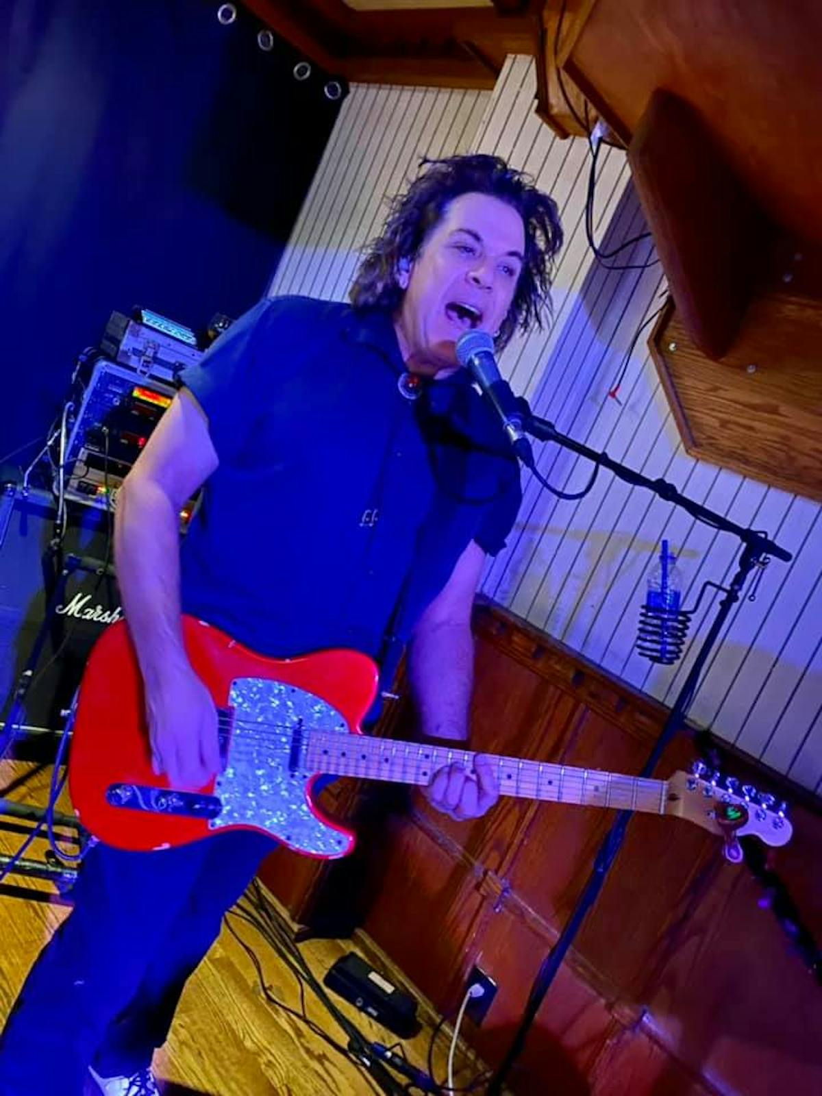 a person sitting on a stage