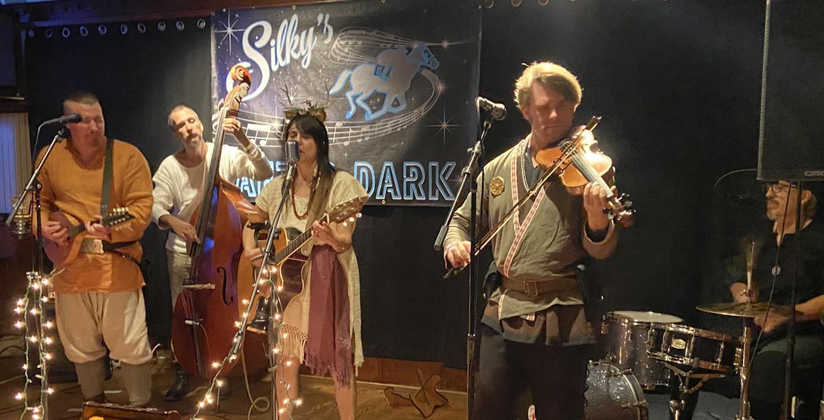 a group of people standing on a stage