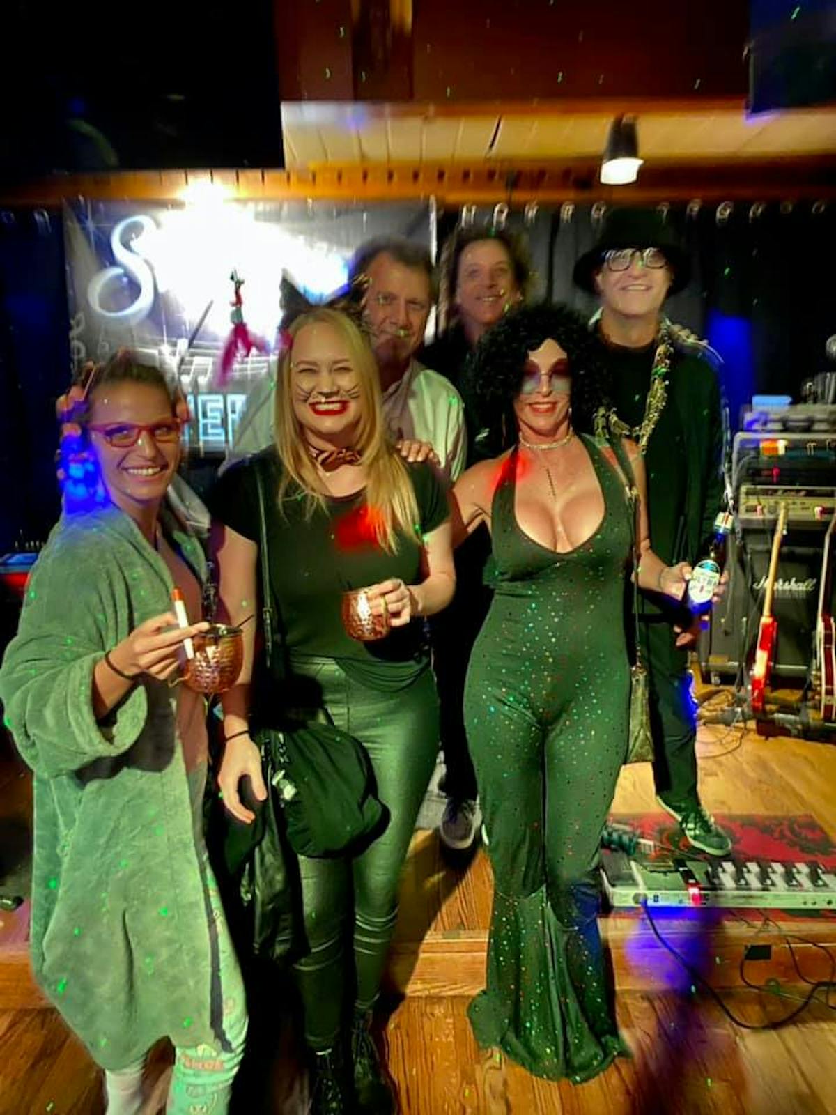 a group of people posing for a photo