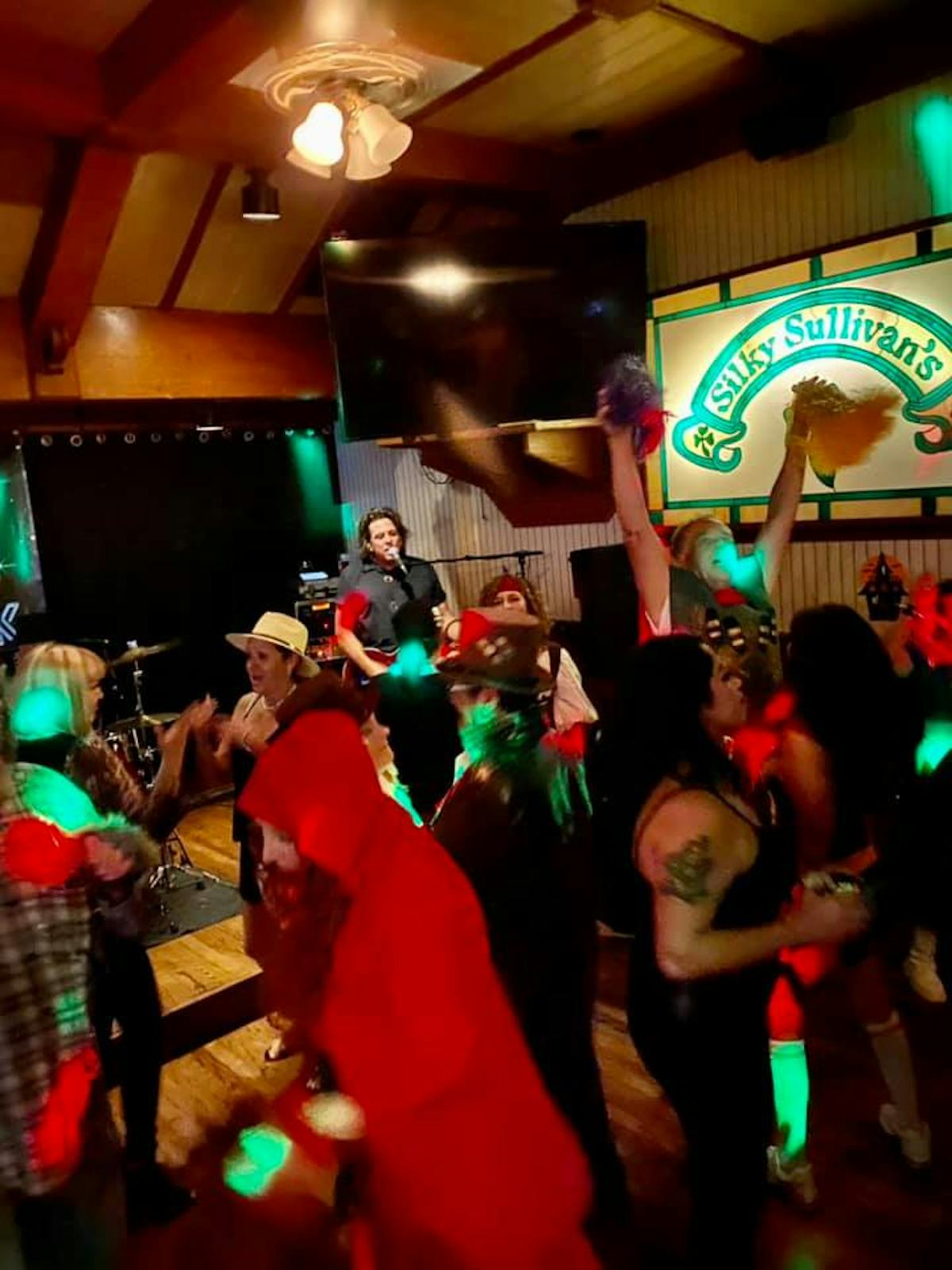 a group of people standing in a room