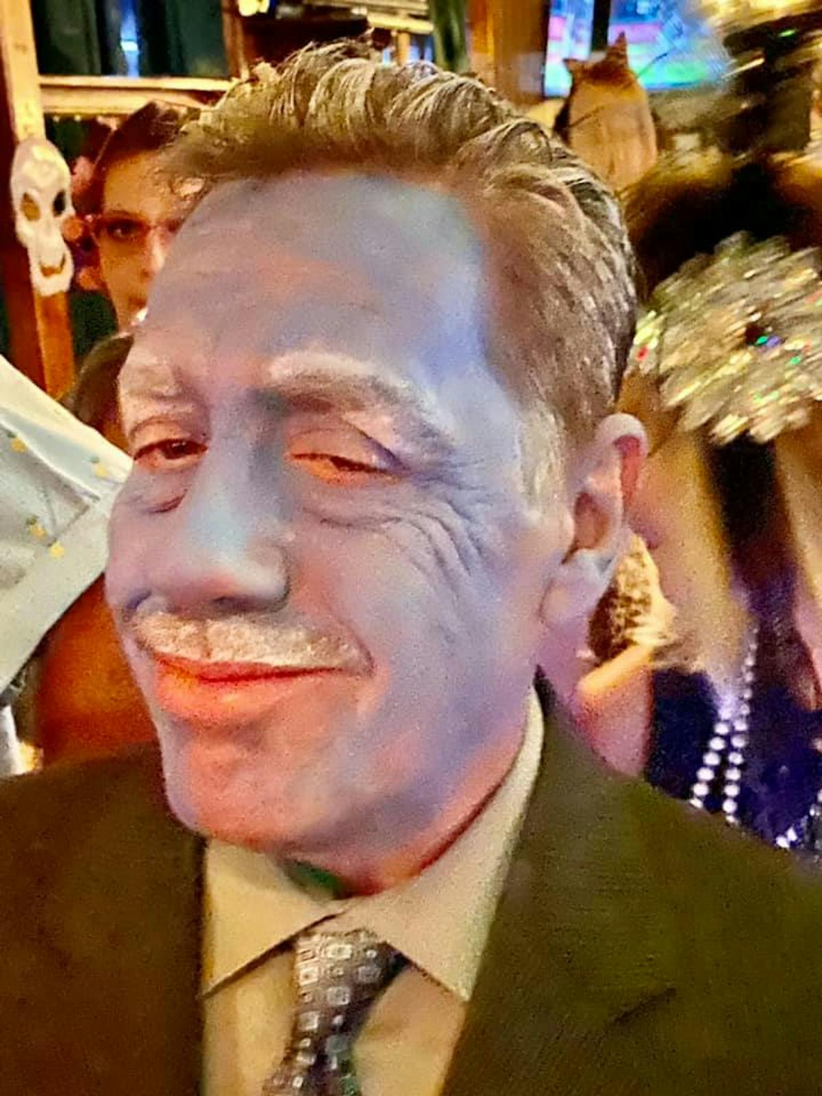a man wearing a suit and tie