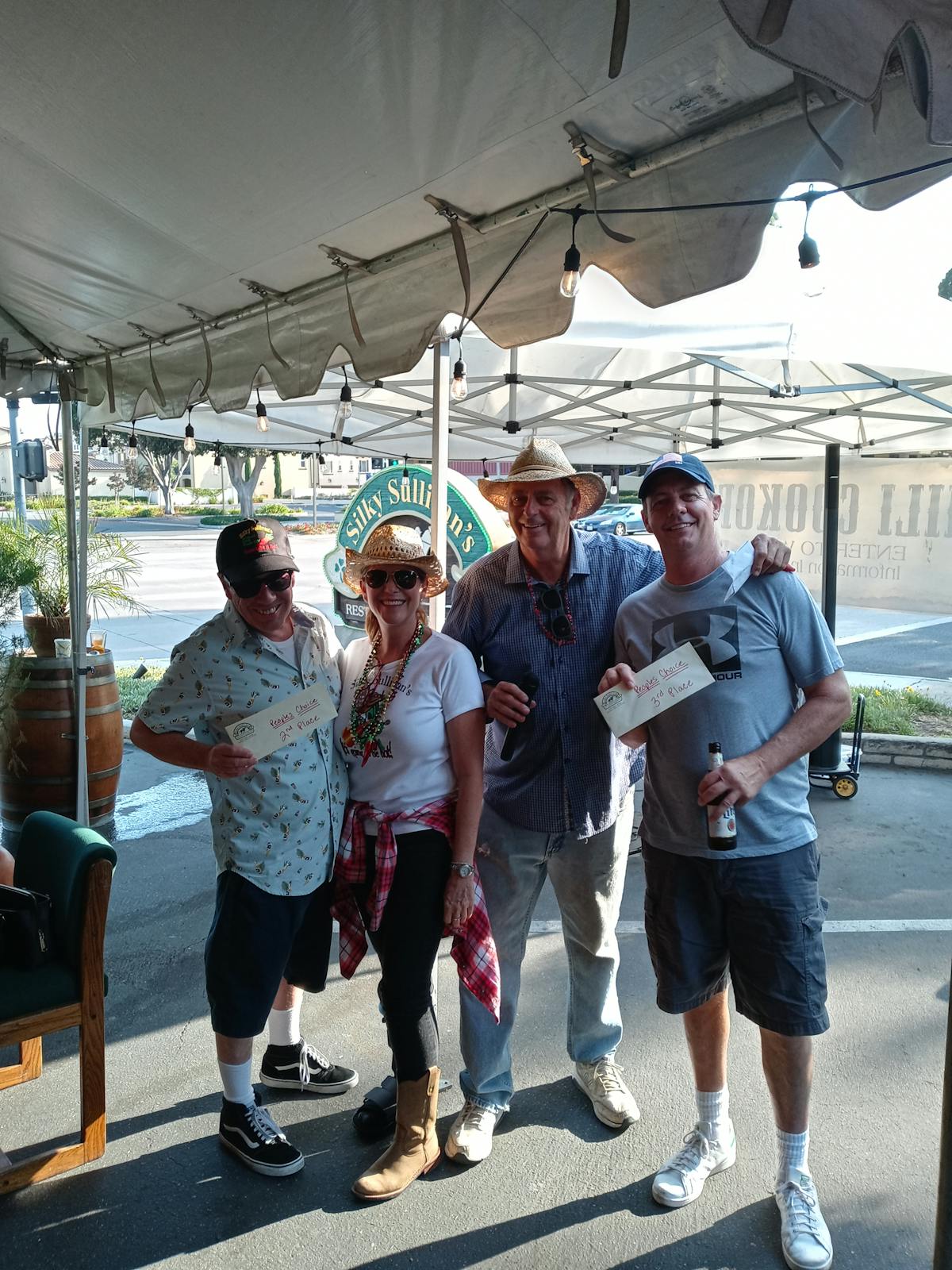 a group of people standing in front of a building
