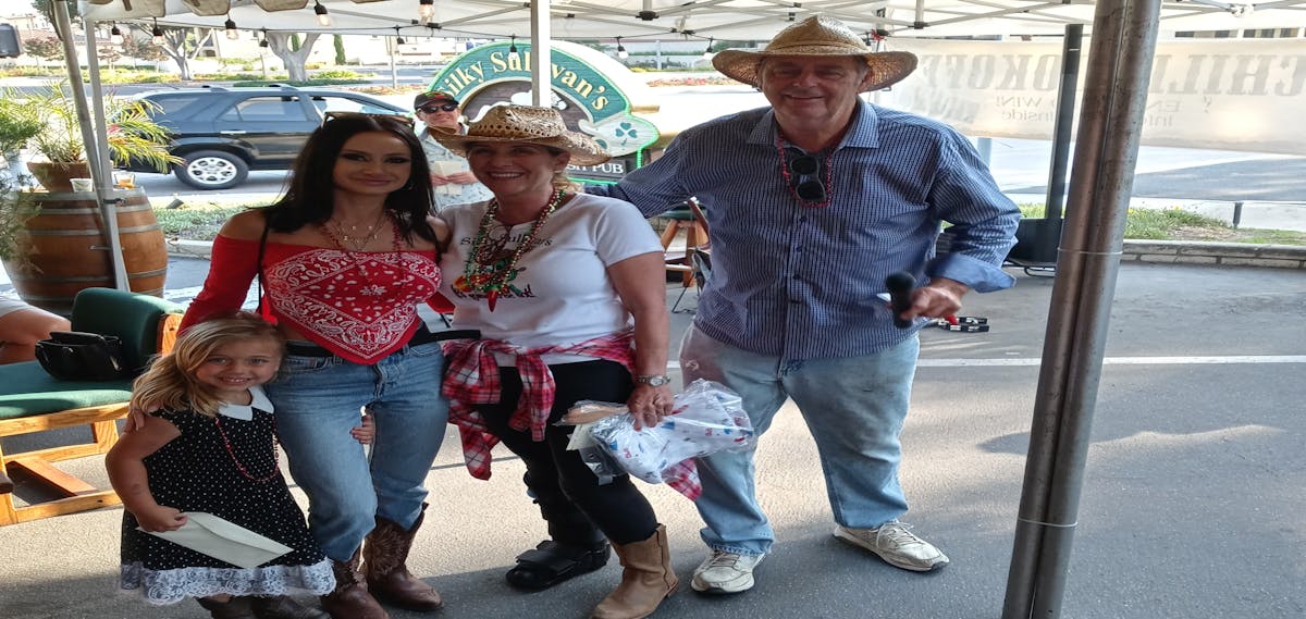 a couple of people that are sitting on a bench