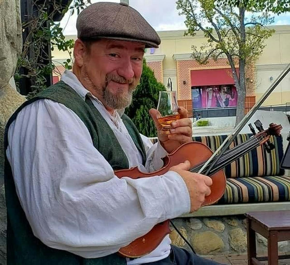 a man sitting on a bench