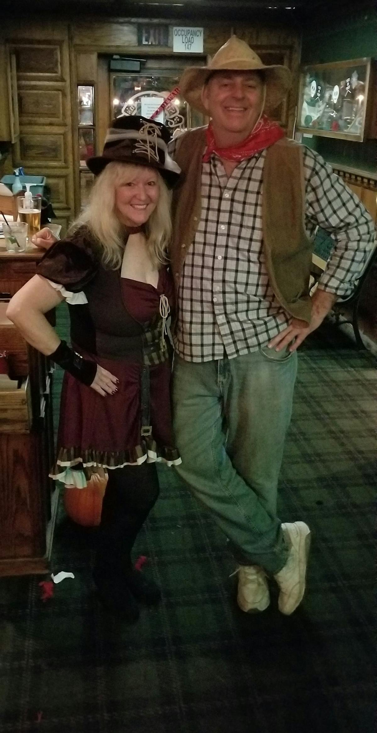 a man and a woman posing for a picture