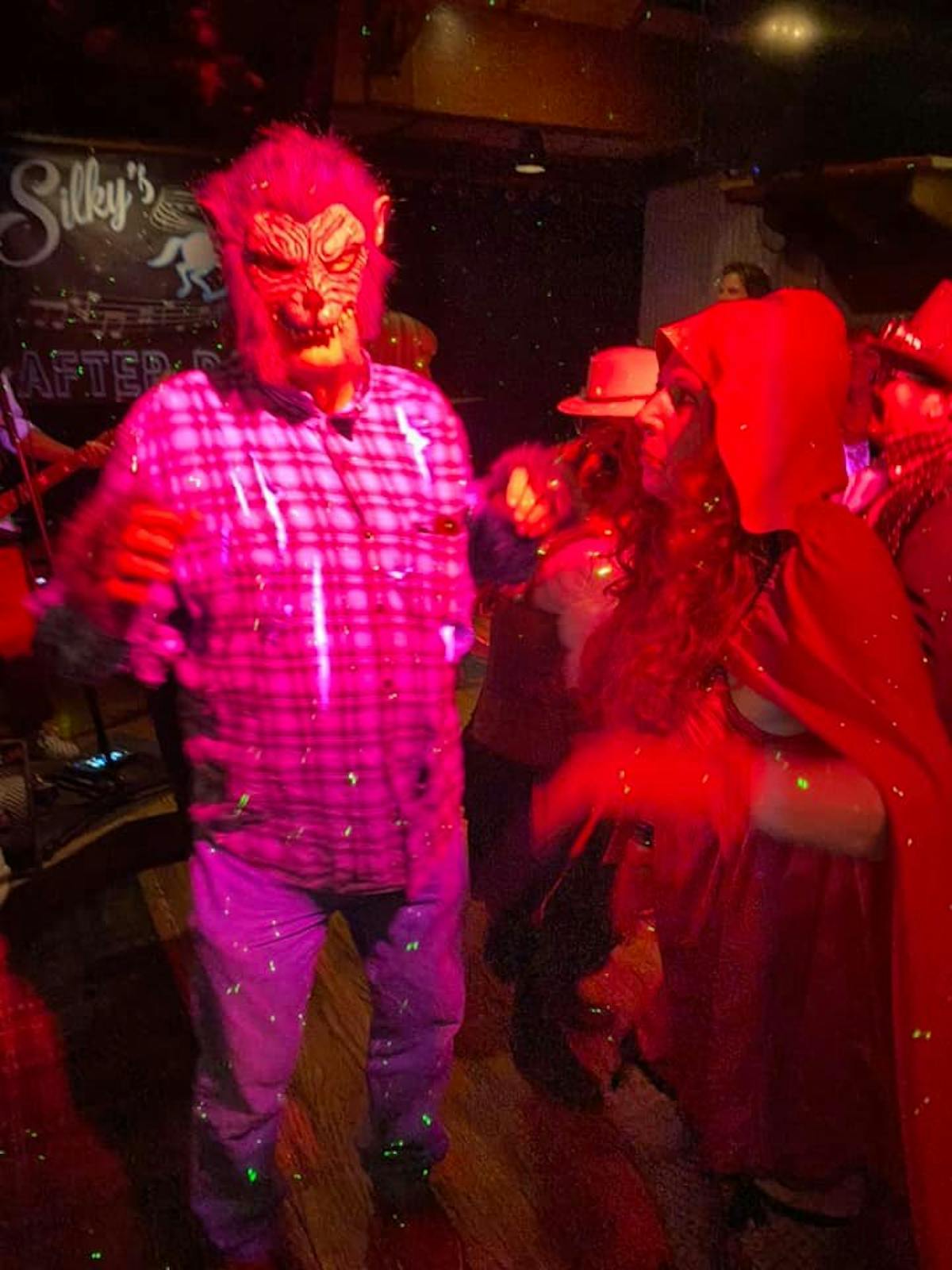 a group of people wearing costumes