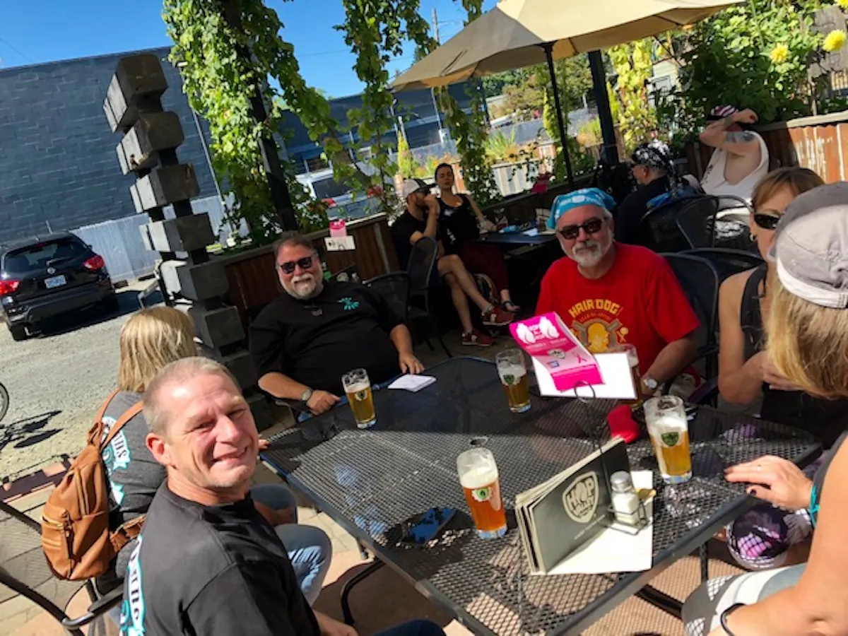 a group of people sitting at a table