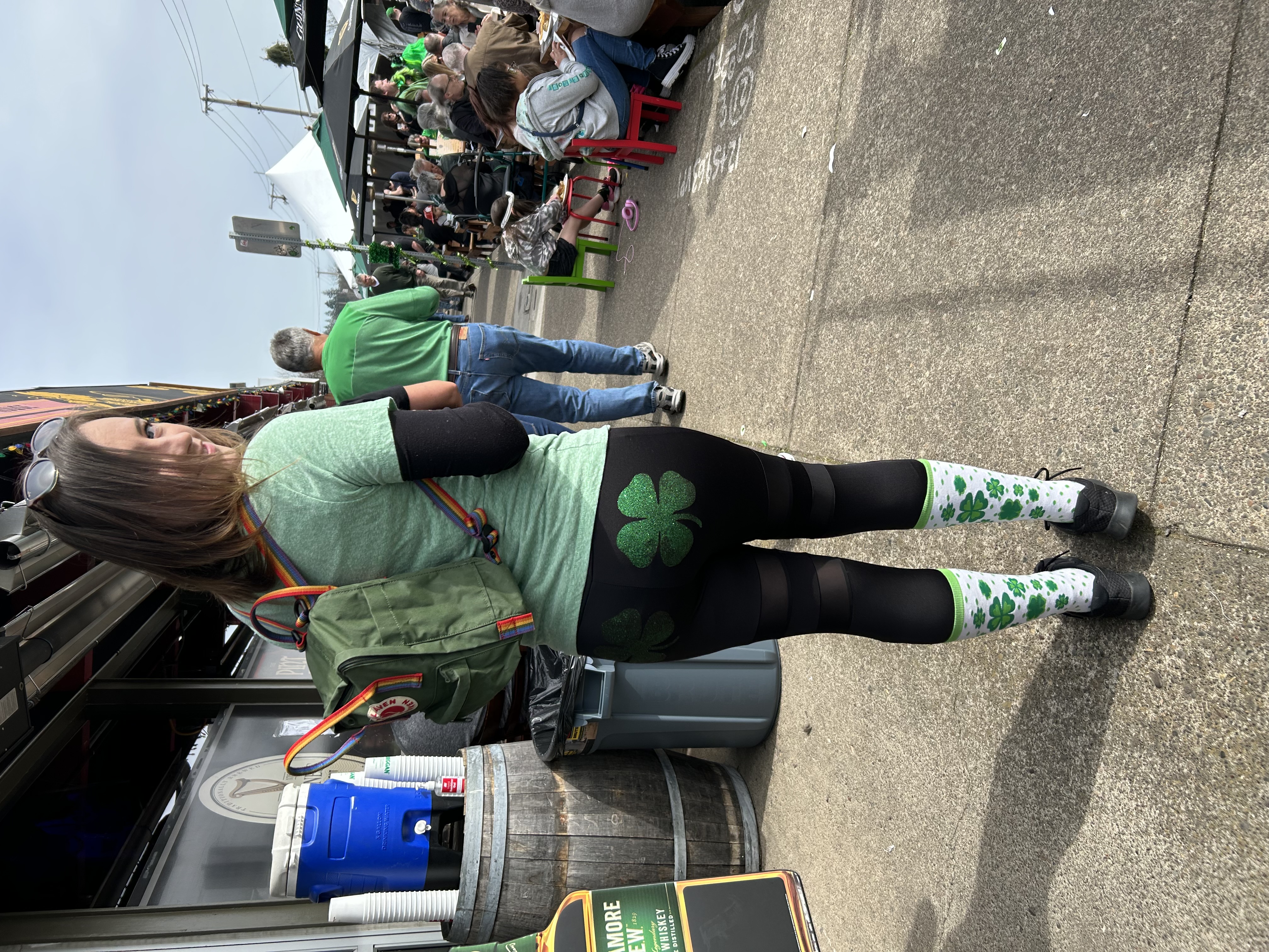 a woman standing in a parking lot