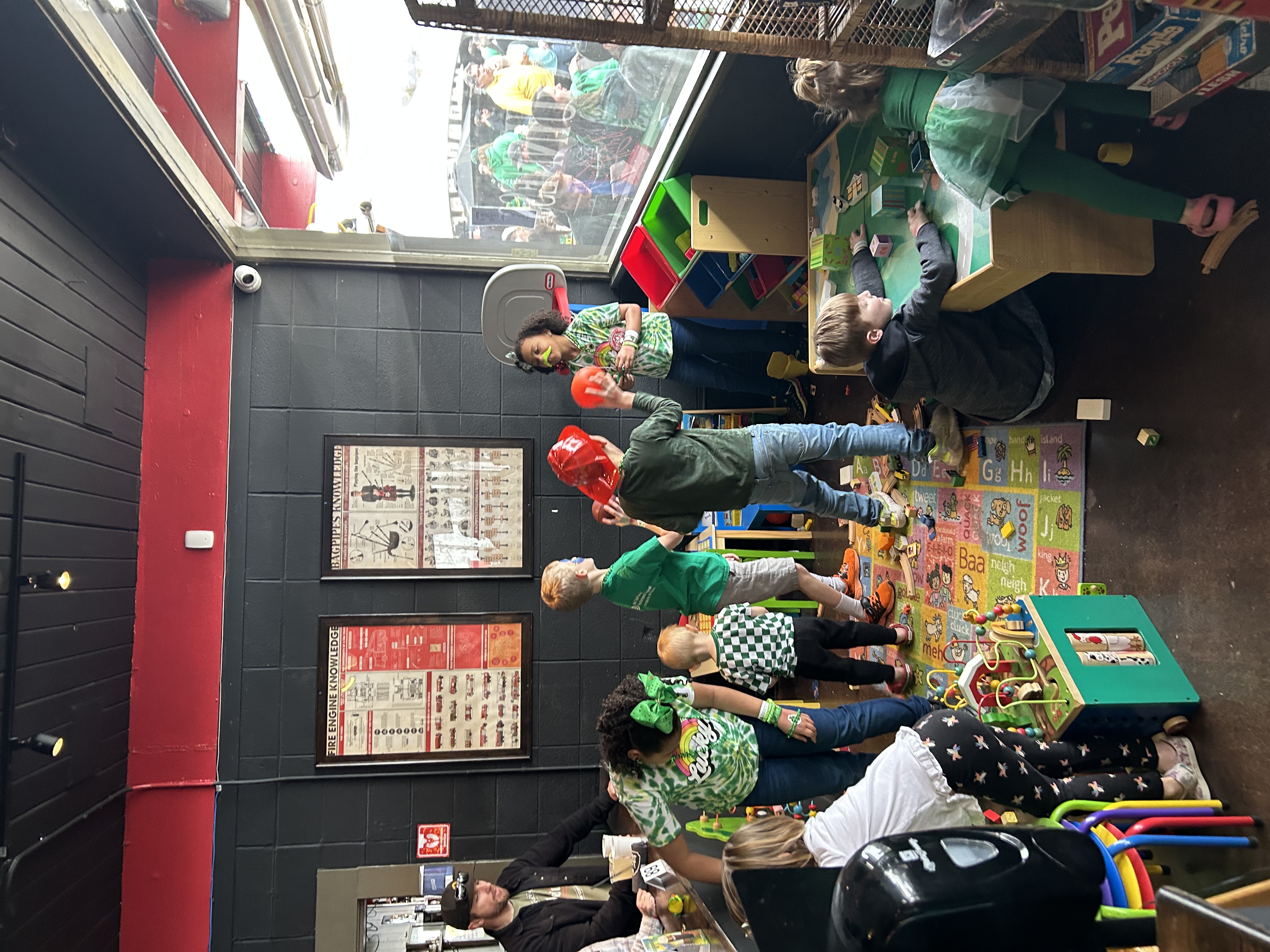 a group of people standing in front of a store