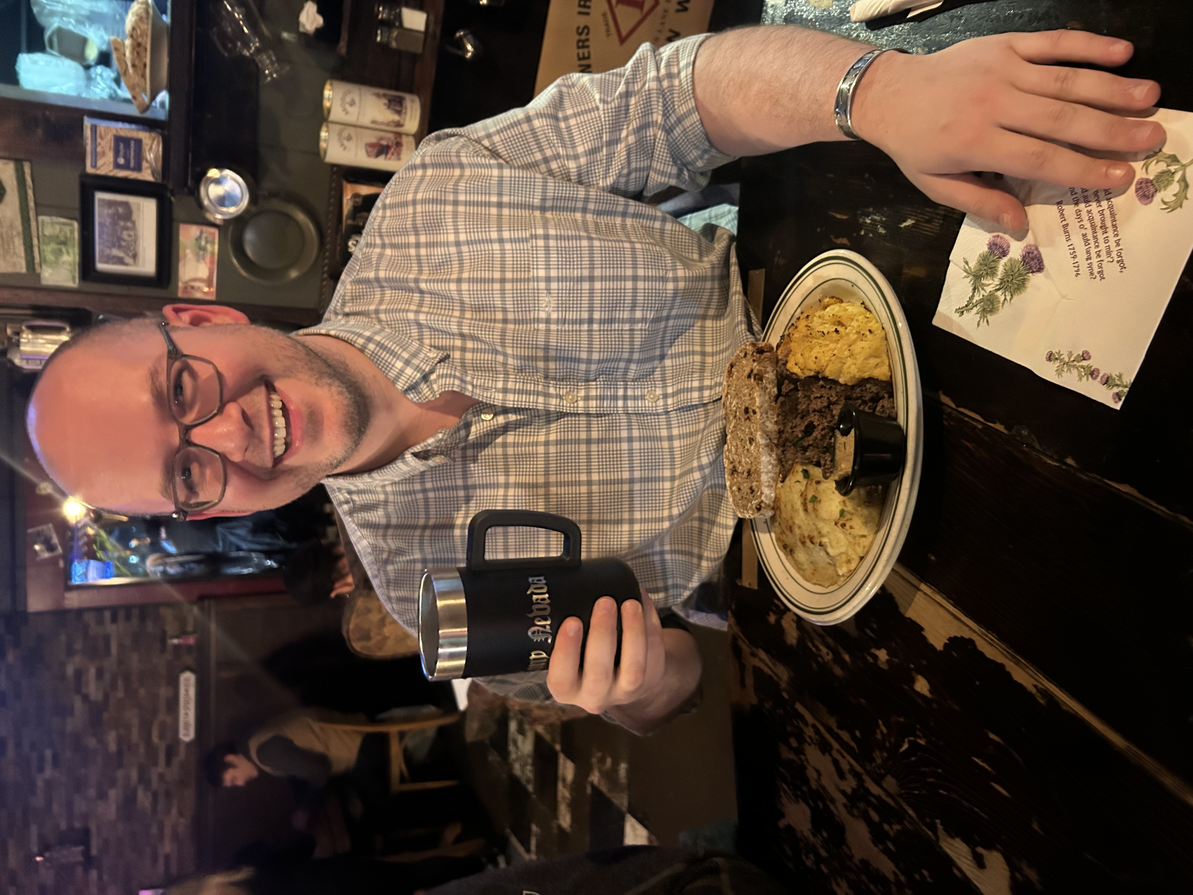 a man holding a glass of wine