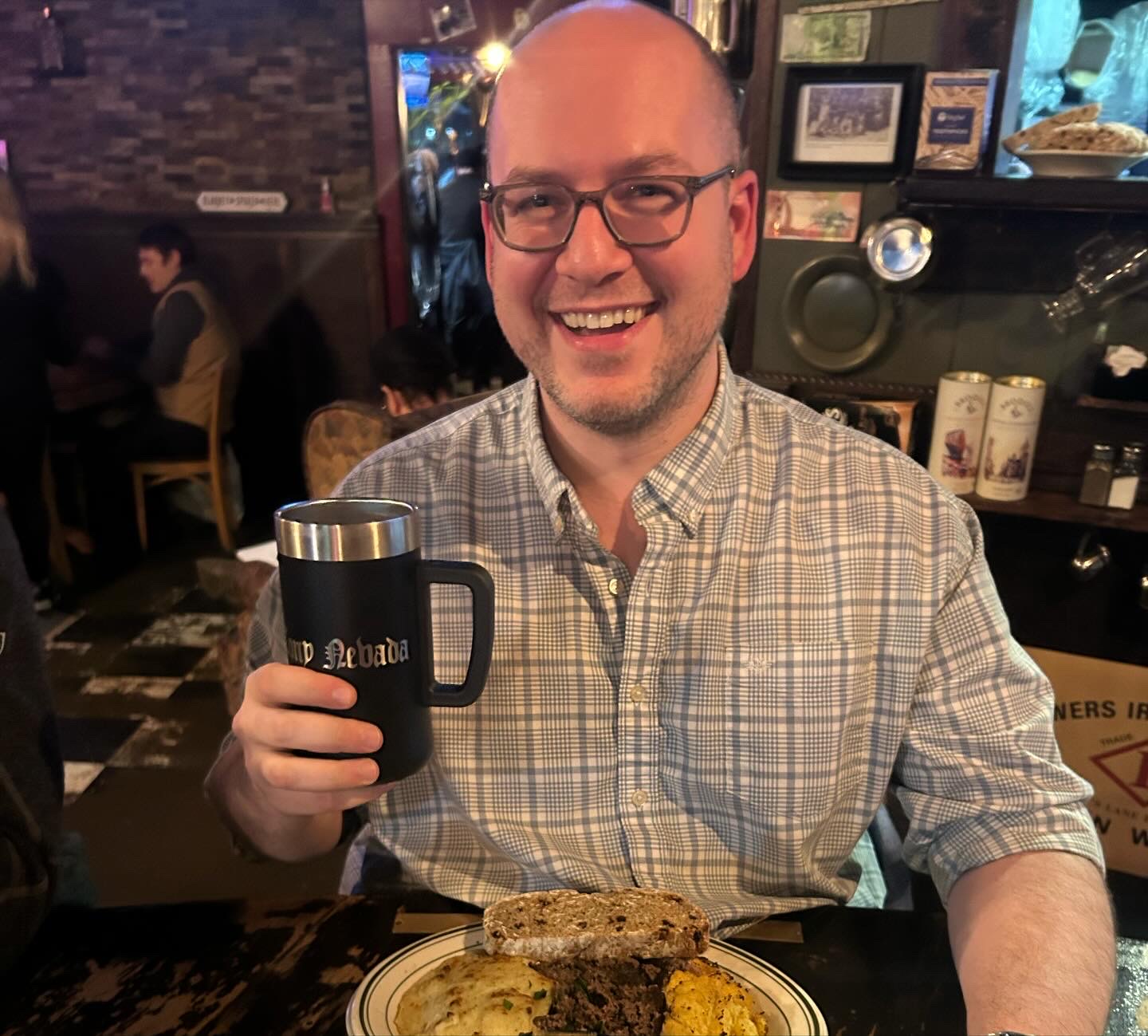 a man holding a glass of wine