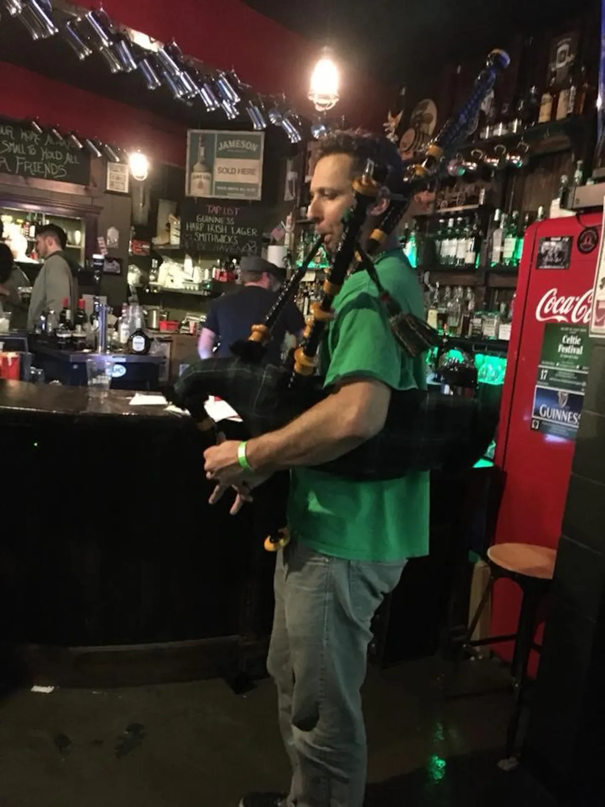 a person standing in front of a restaurant