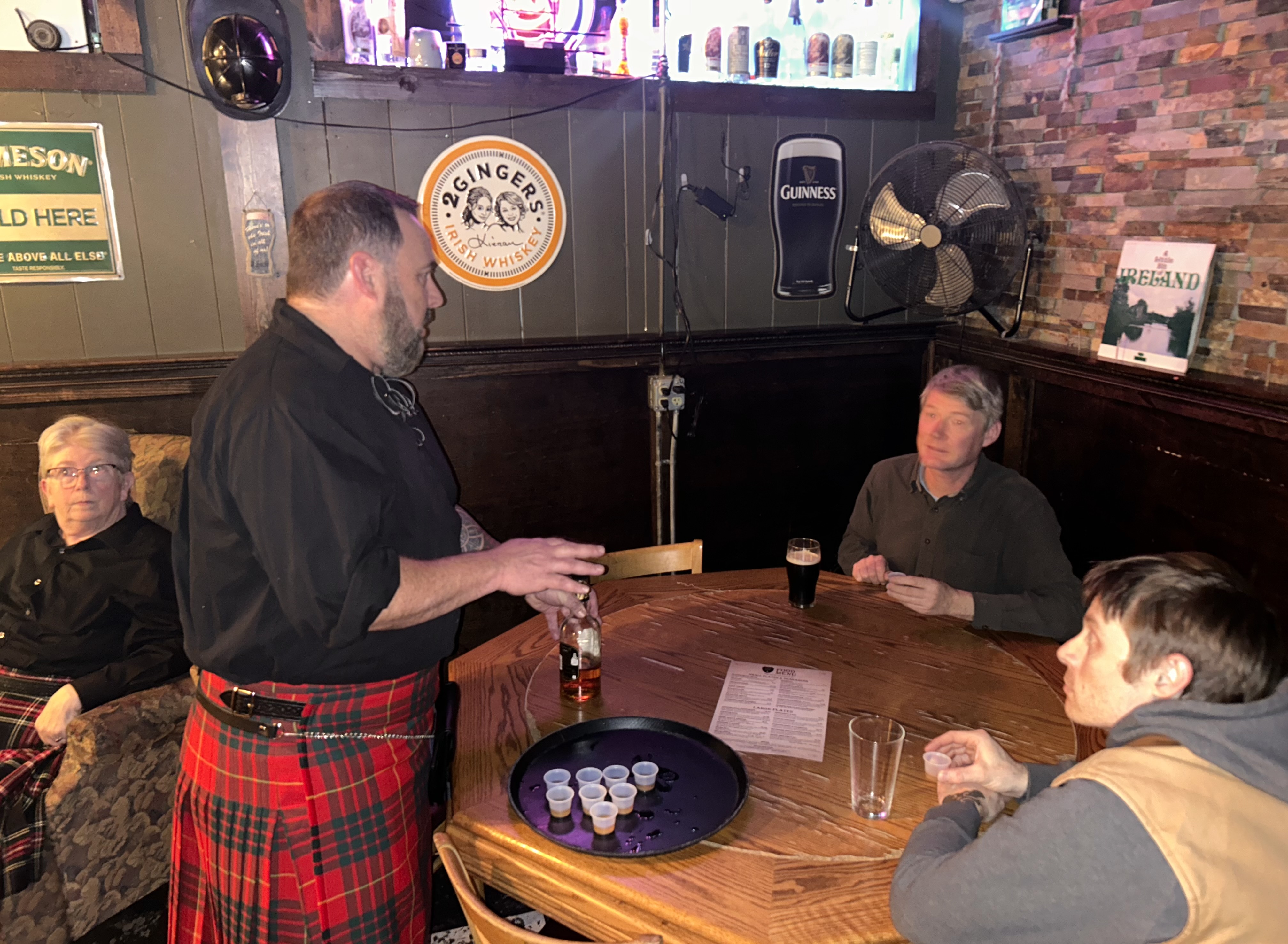 a group of people sitting at a table