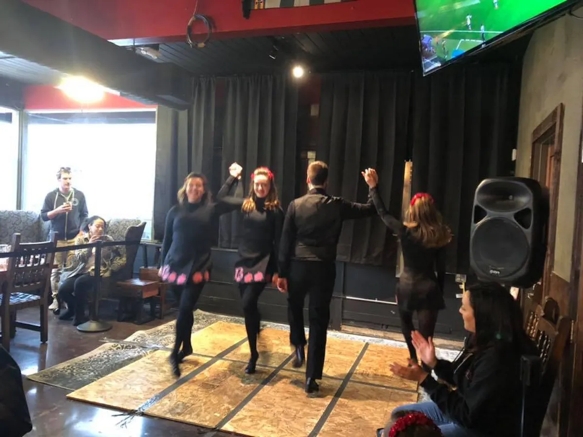 a group of people standing in a room