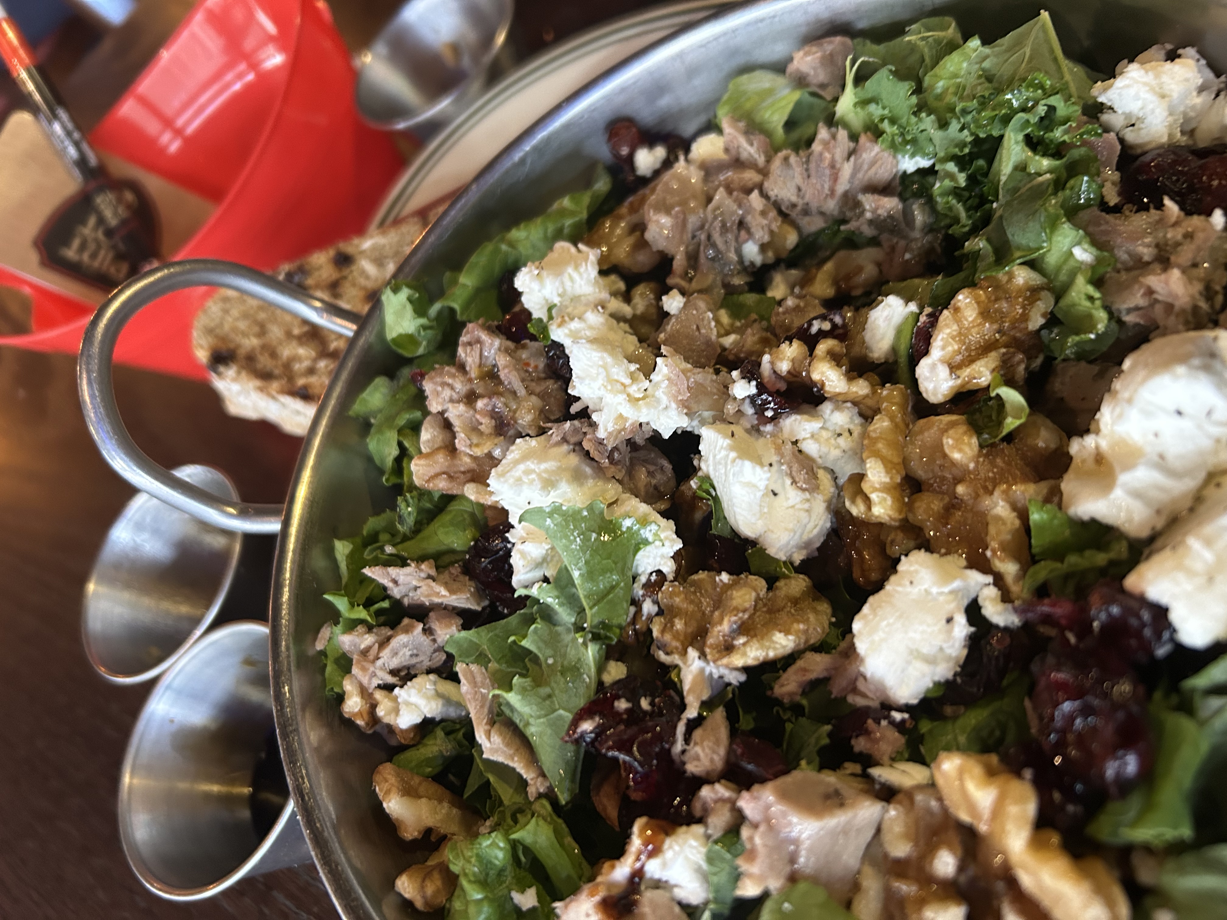 a bowl of food with broccoli