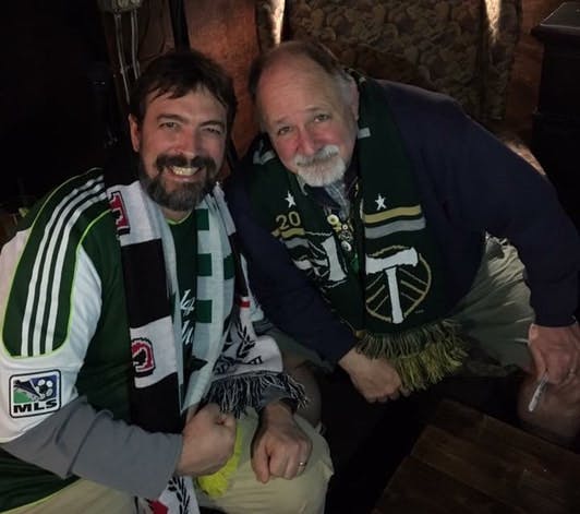 a group of people posing for the camera