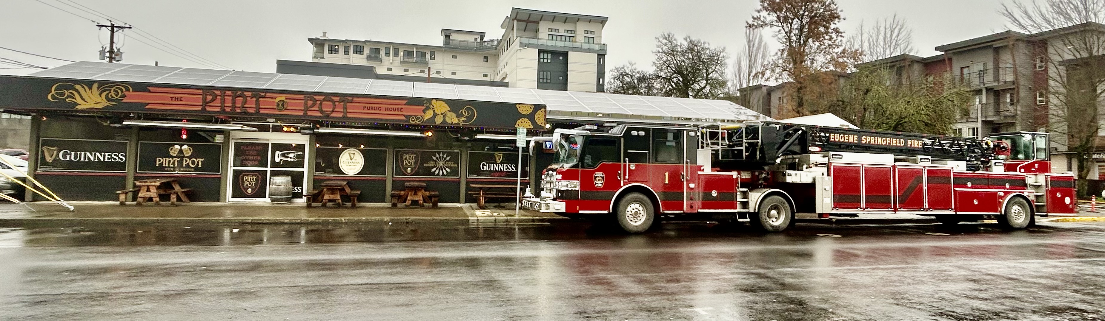 a fire truck parked in front of a building