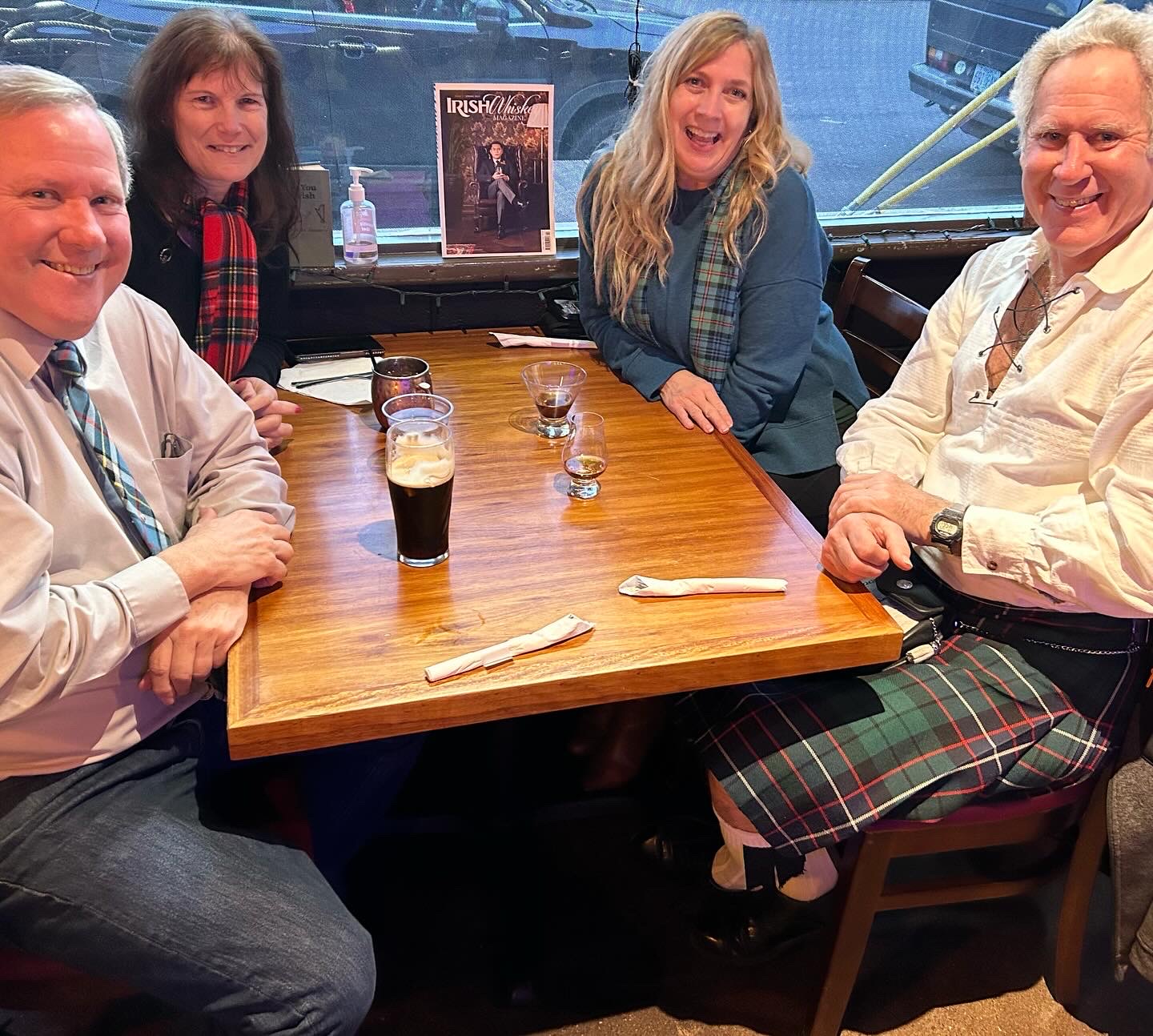 a group of people sitting at a table