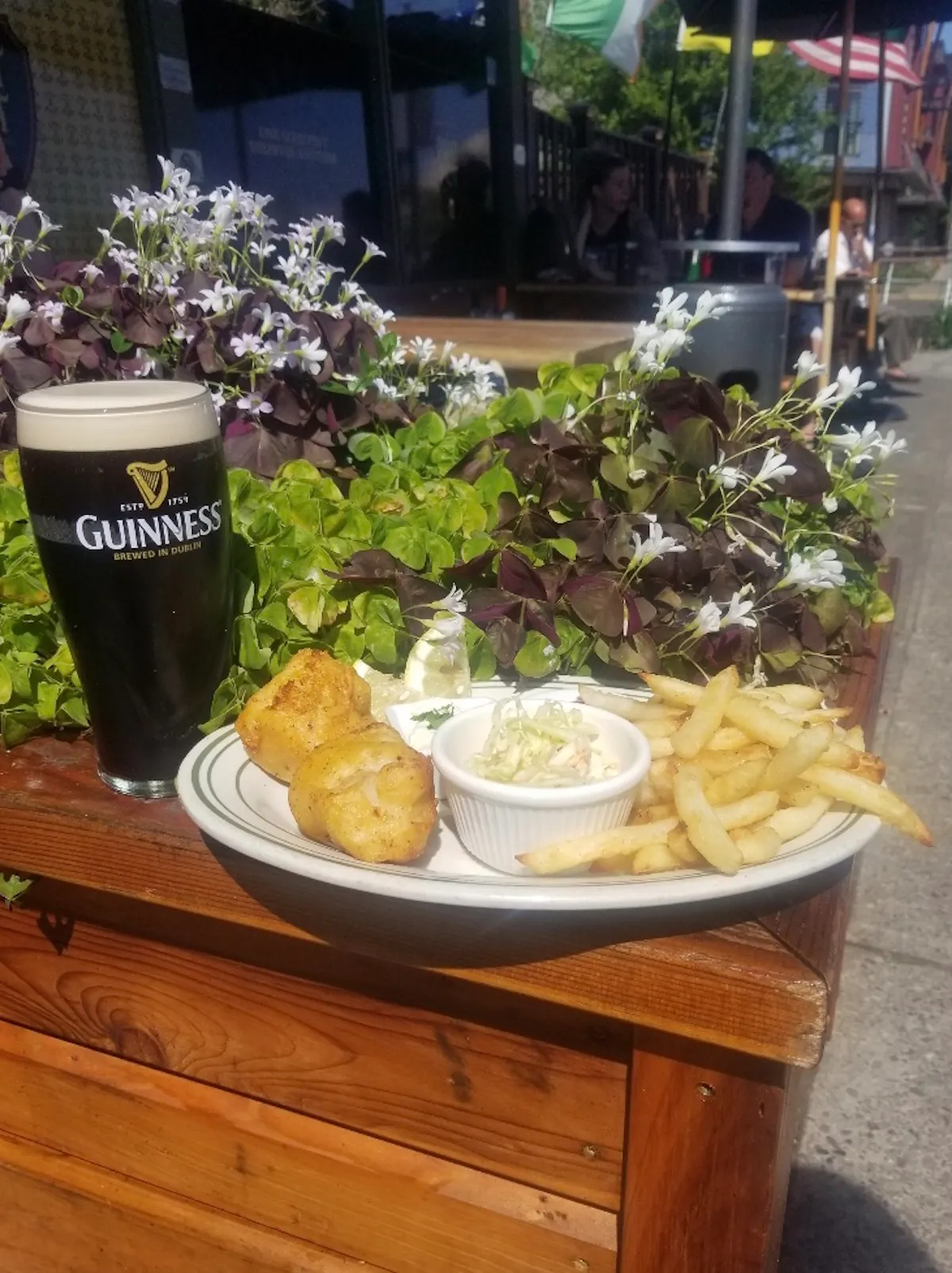 a sandwich sitting on top of a wooden table