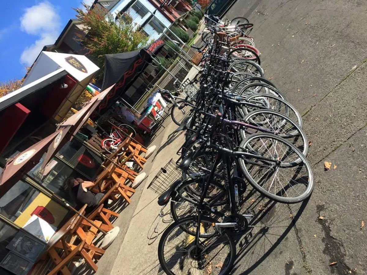 a bicycle parked on the side of the street
