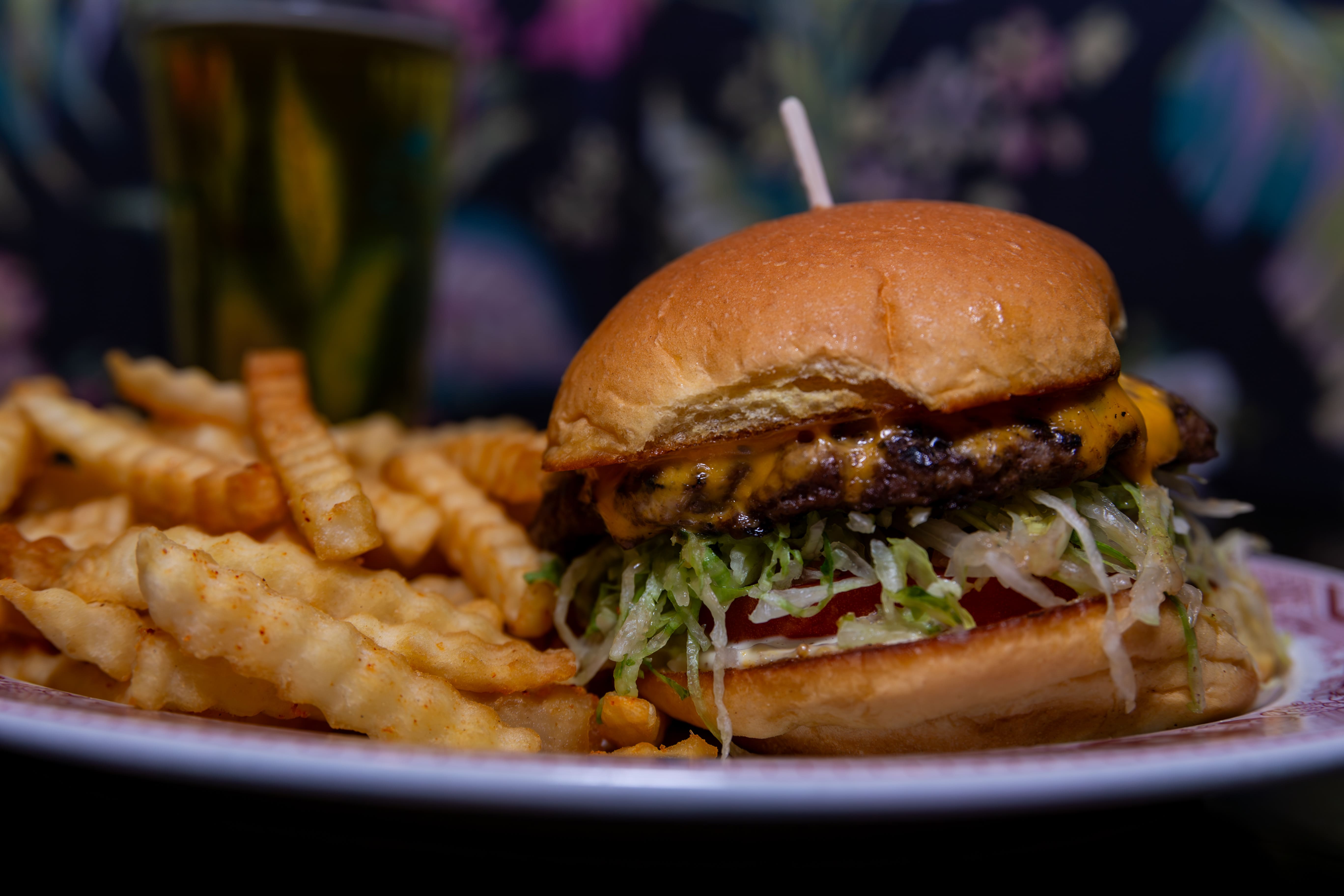 Burger and crinkle-cut fries photographed for Starboard Tack