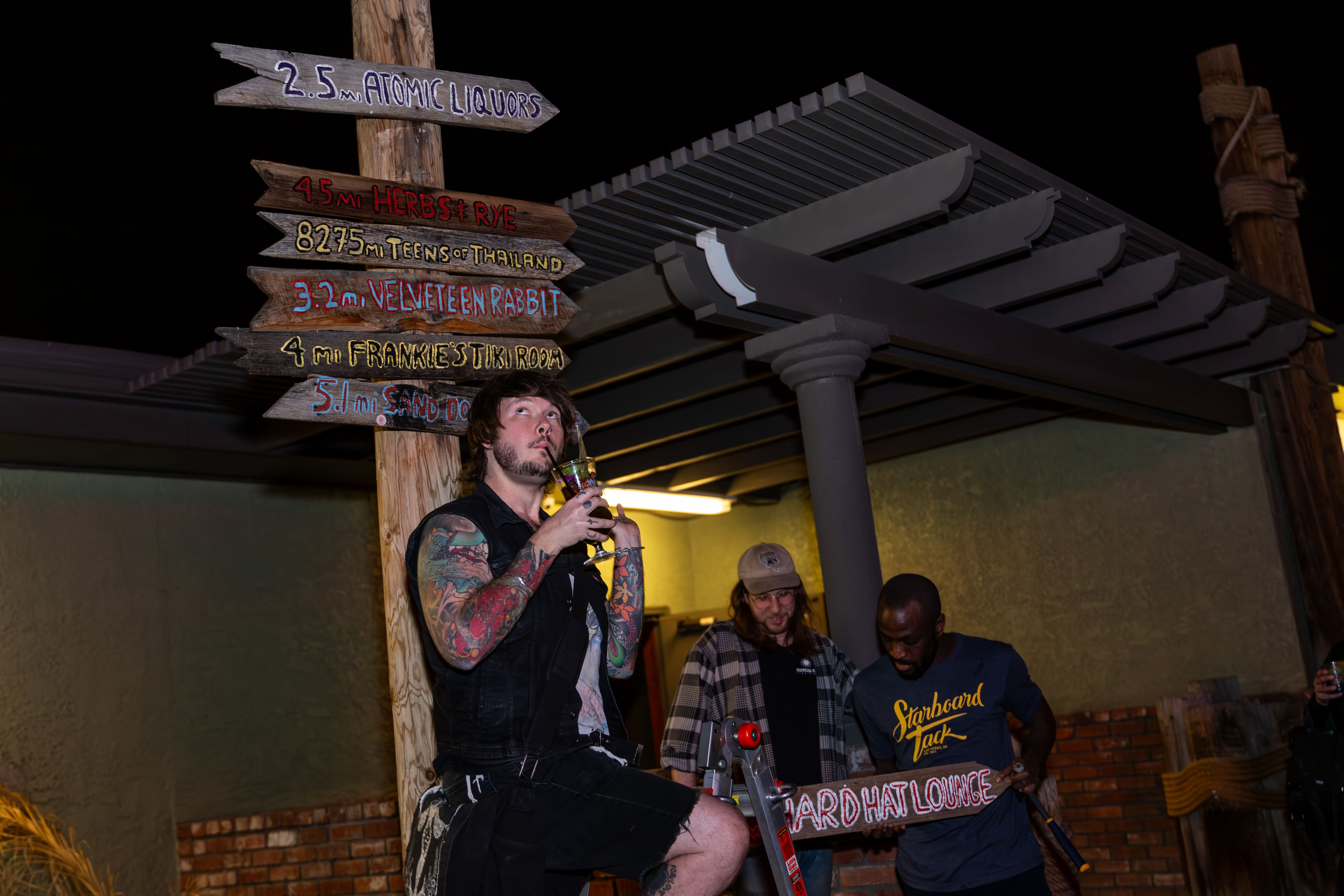 Guests gathered outside Starboard Tack at night