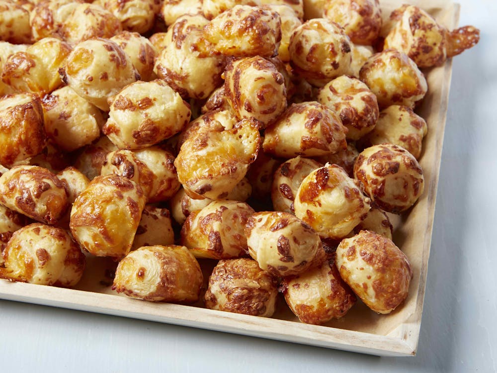 a platter of mini cheese straws