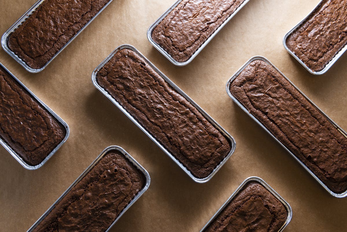 several rectangular brownie cakes arranged in a herringbone pattern