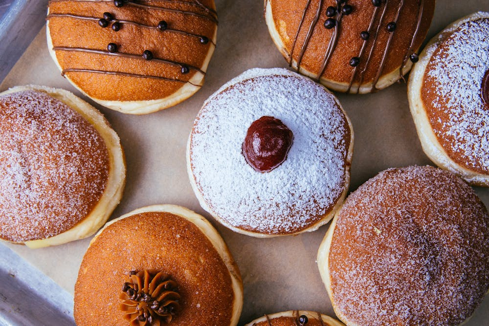 a box filled with different kinds of donuts