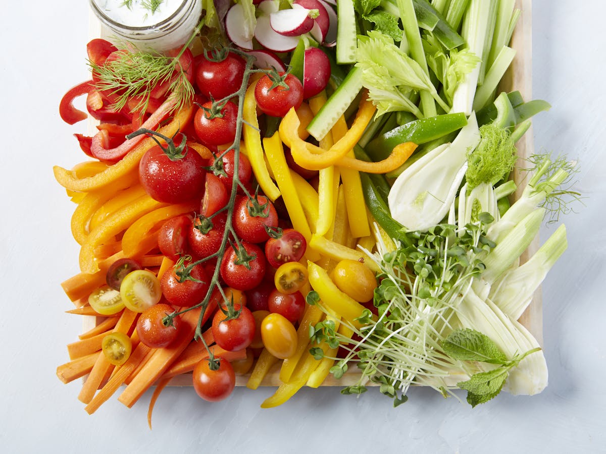 a bowl of fruit and vegetable salad