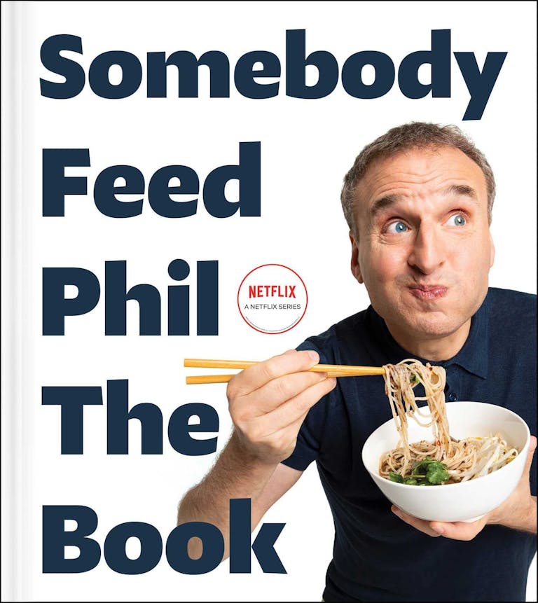 Philip Rosenthal holding a plate of food