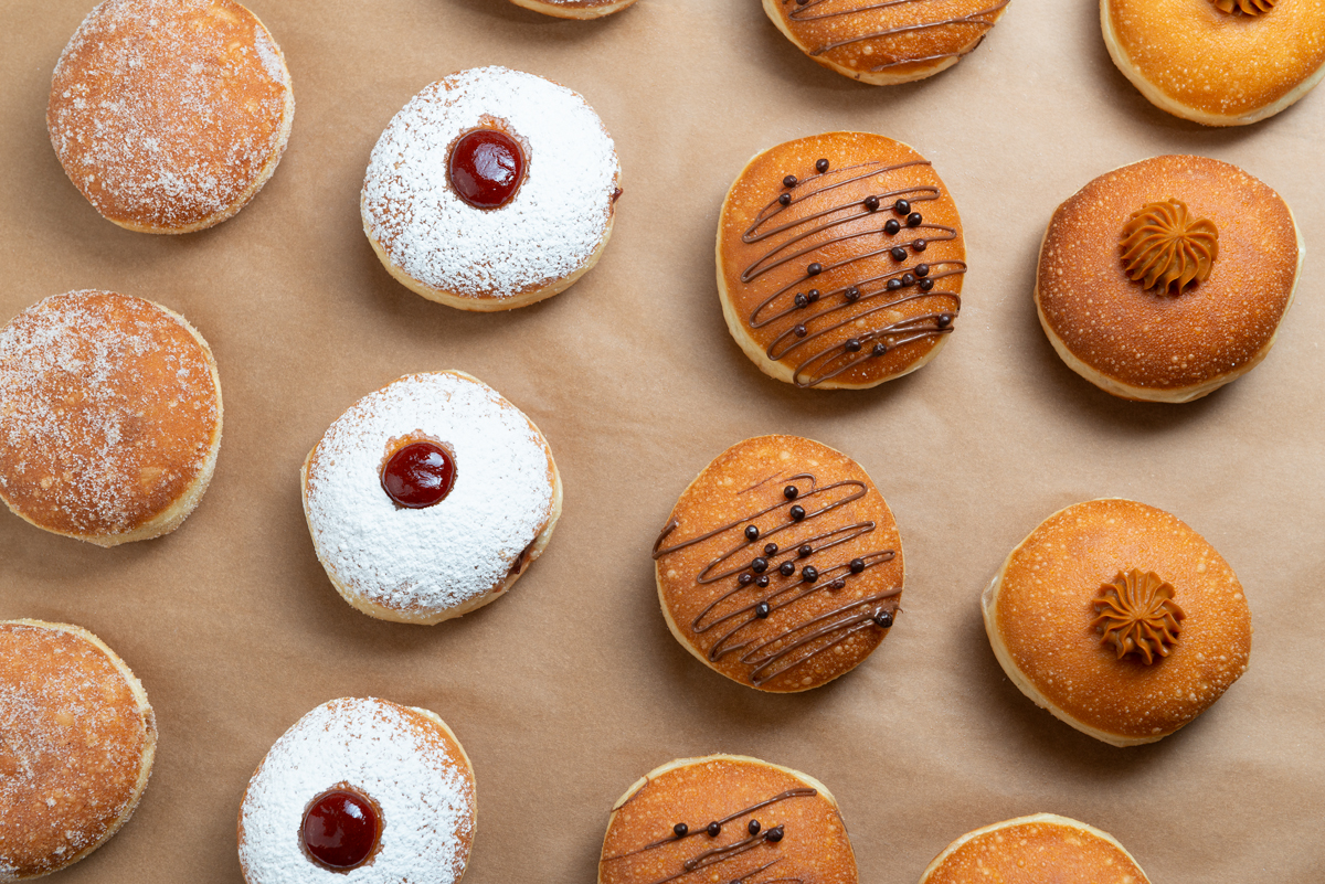 a box filled with different kinds of donuts