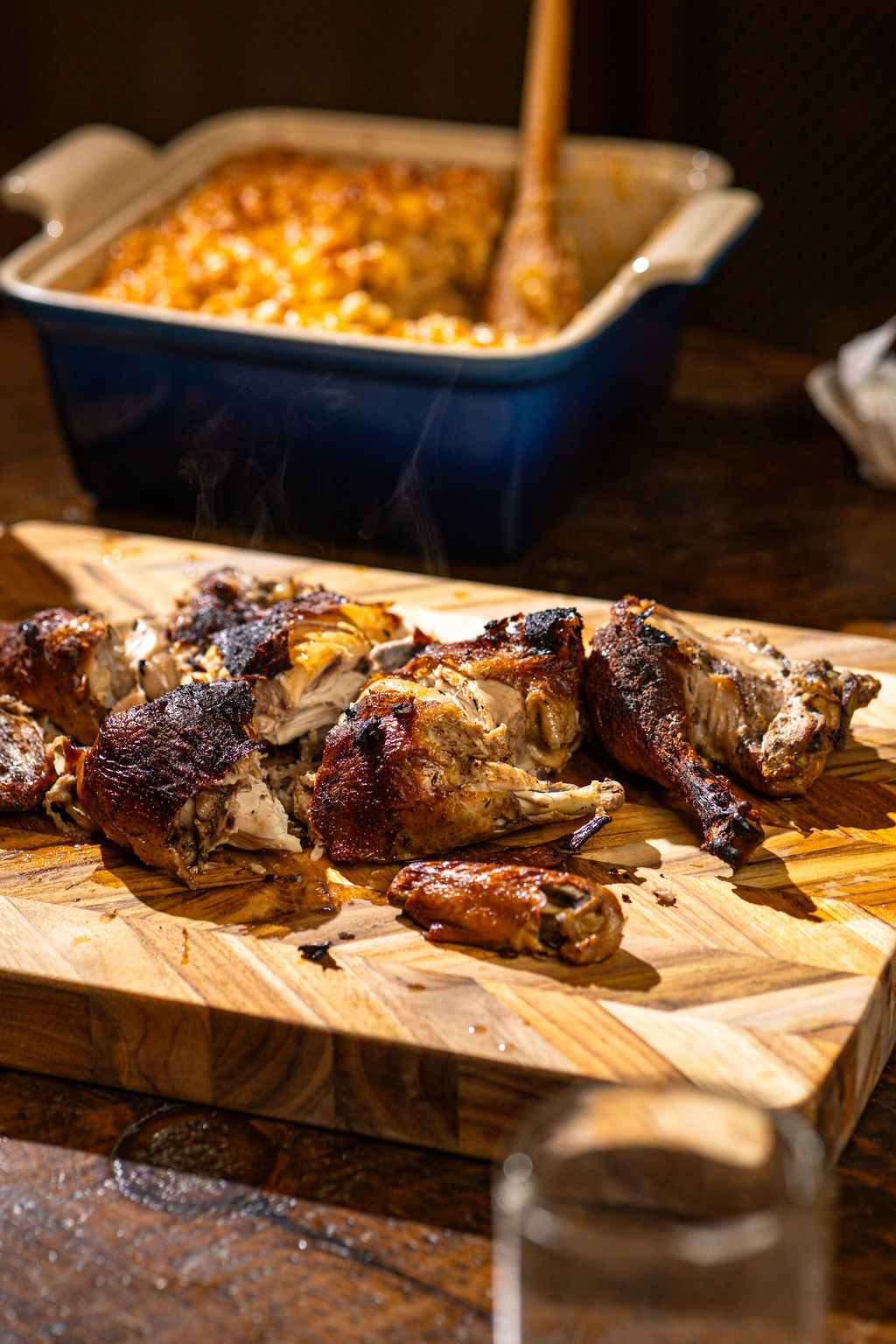 a pizza sitting on top of a wooden cutting board