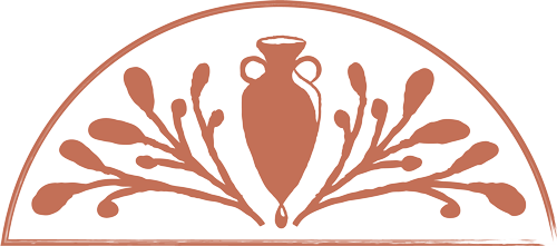 a black and orange vase with leaves