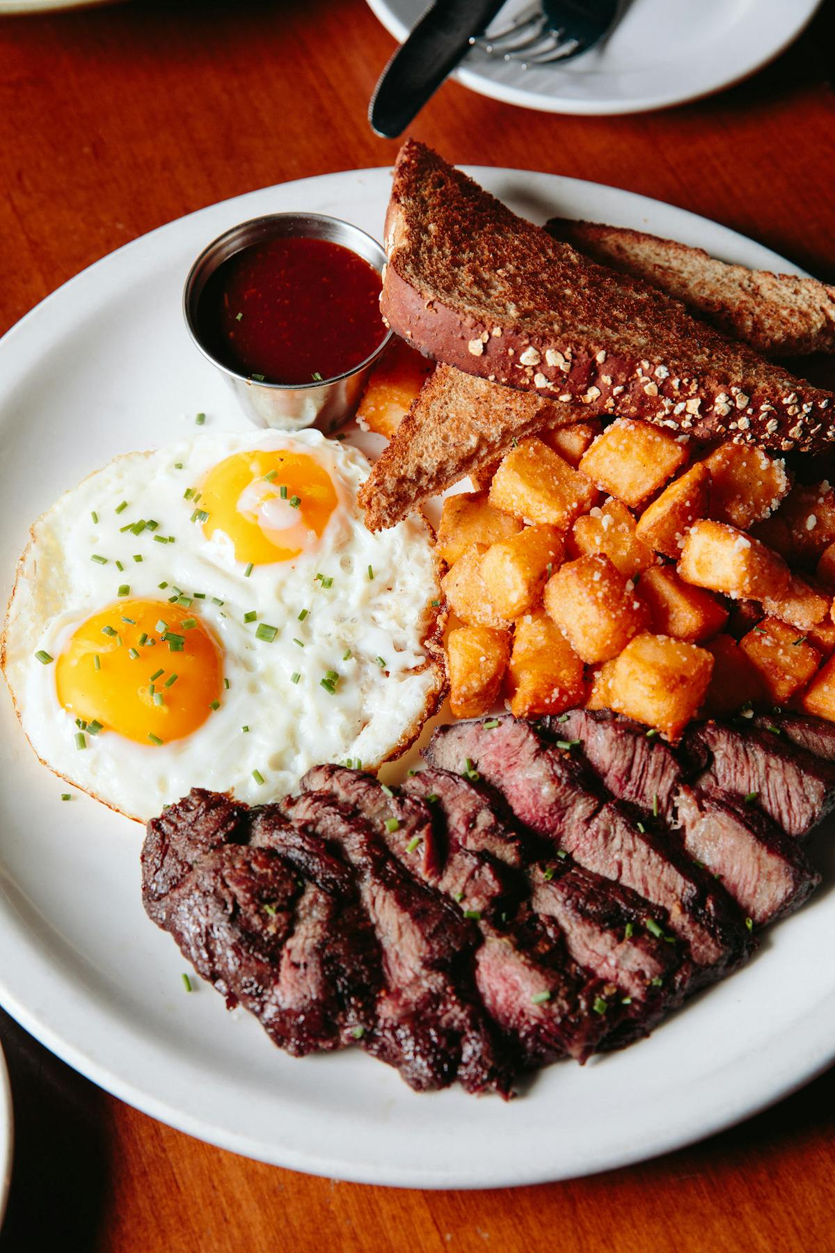 a plate of food on a table for brunch in boston