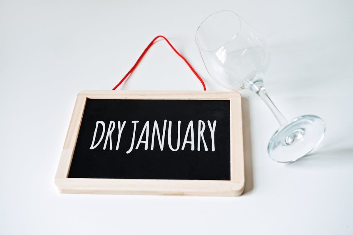 Dry January chalkboard with empty wine glass