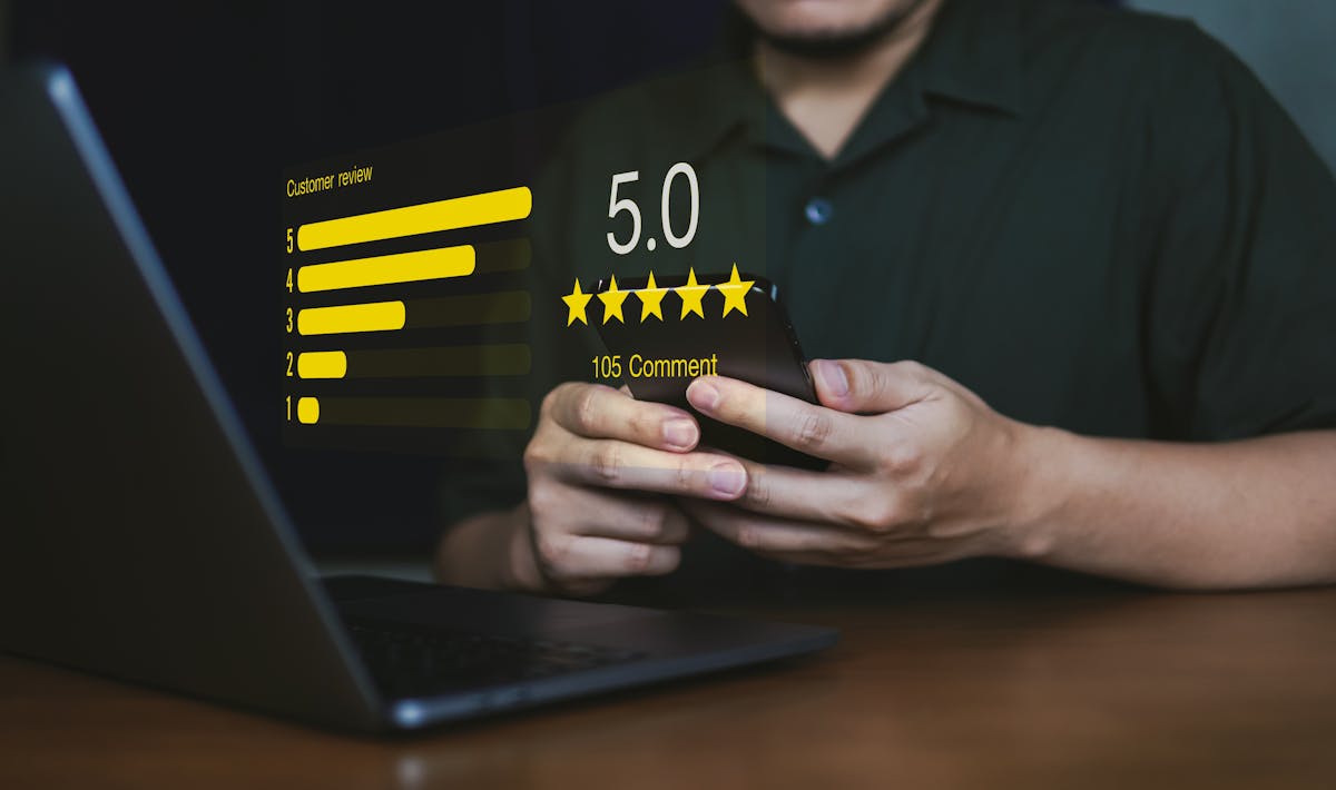 a man holding a laptop