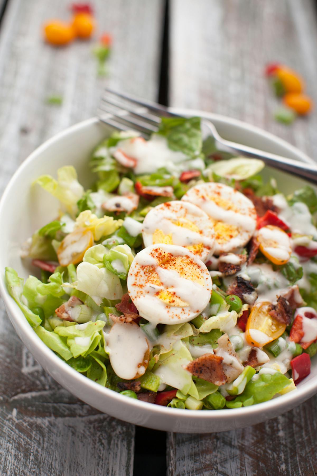 a bowl of salad on a plate