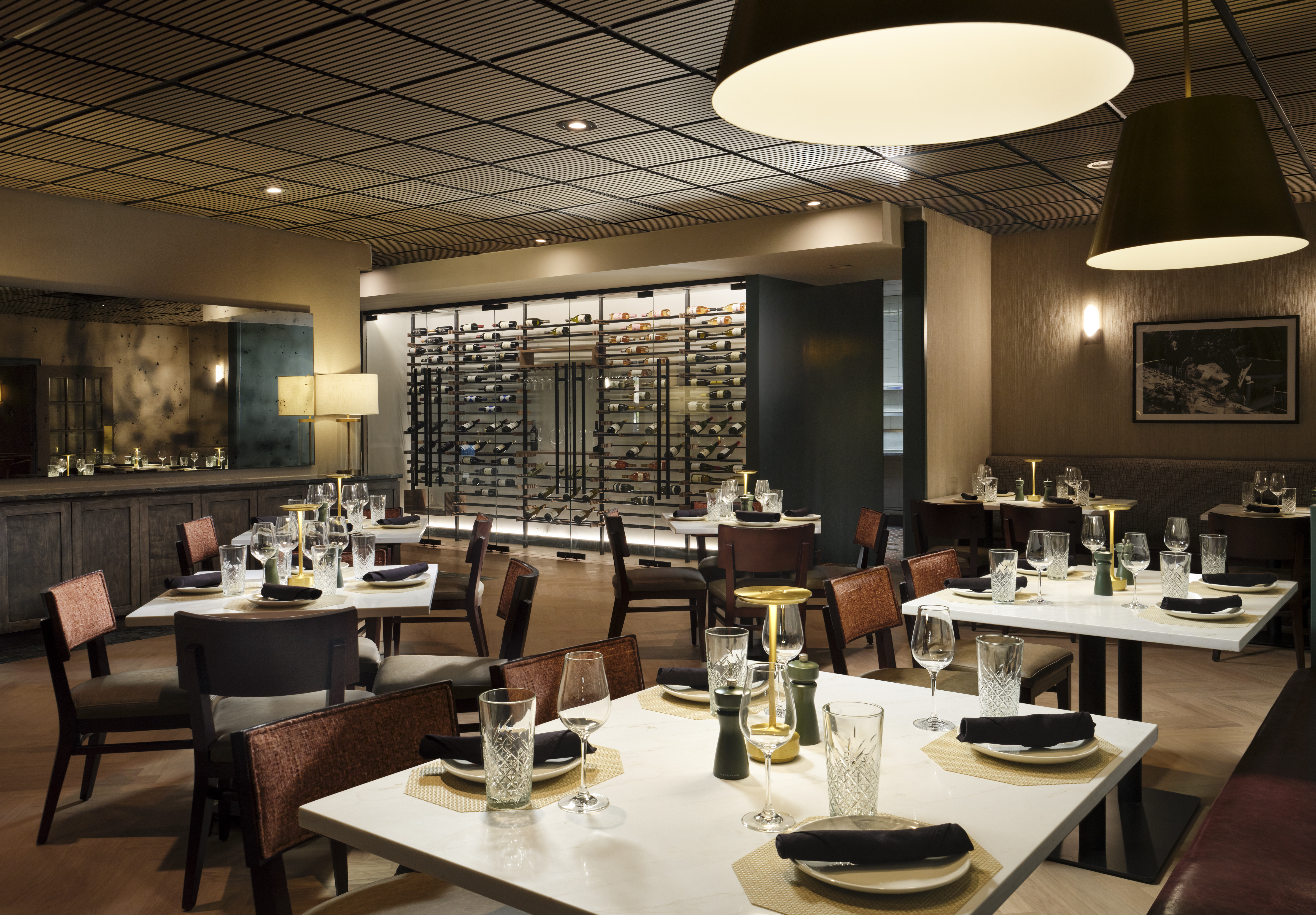 a restaurant with tables and chairs